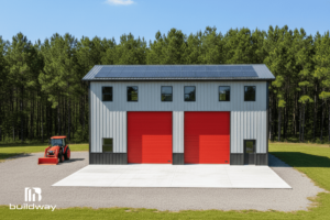 Custom 40x50 Steel Workshop 3 Exterior front view of a two-story steel workshop with twin red doors and a gabled roof, surrounded by green trees.