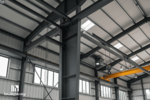 Custom 40x50 Steel Workshop 4 Close-up of the workshop’s steel framing and ceiling structure, showing the heavy-duty beams and bracing.